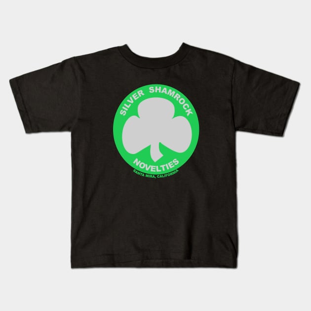 Silver Shamrock Novelties Kids T-Shirt by AngryMongoAff